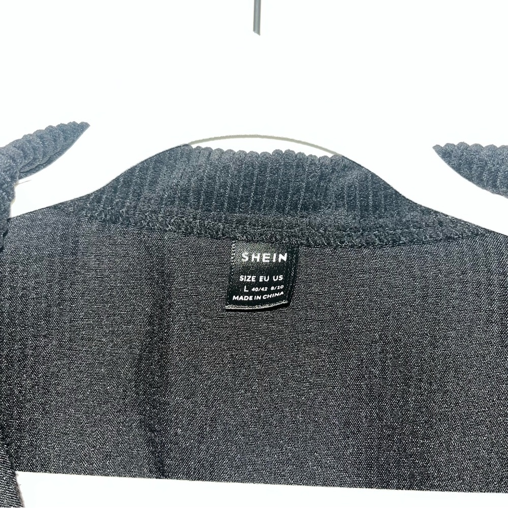 Black Corduroy Jacket with button detail, drop shoulder, and flap pocket - Picture 3 of 4